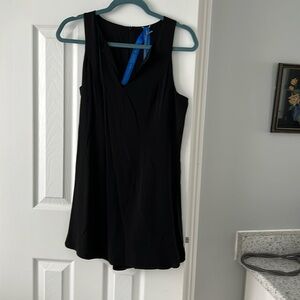 Kit and Ace “Hide and sleek” romper. Sleeveless with skort. Black size 6 NWT